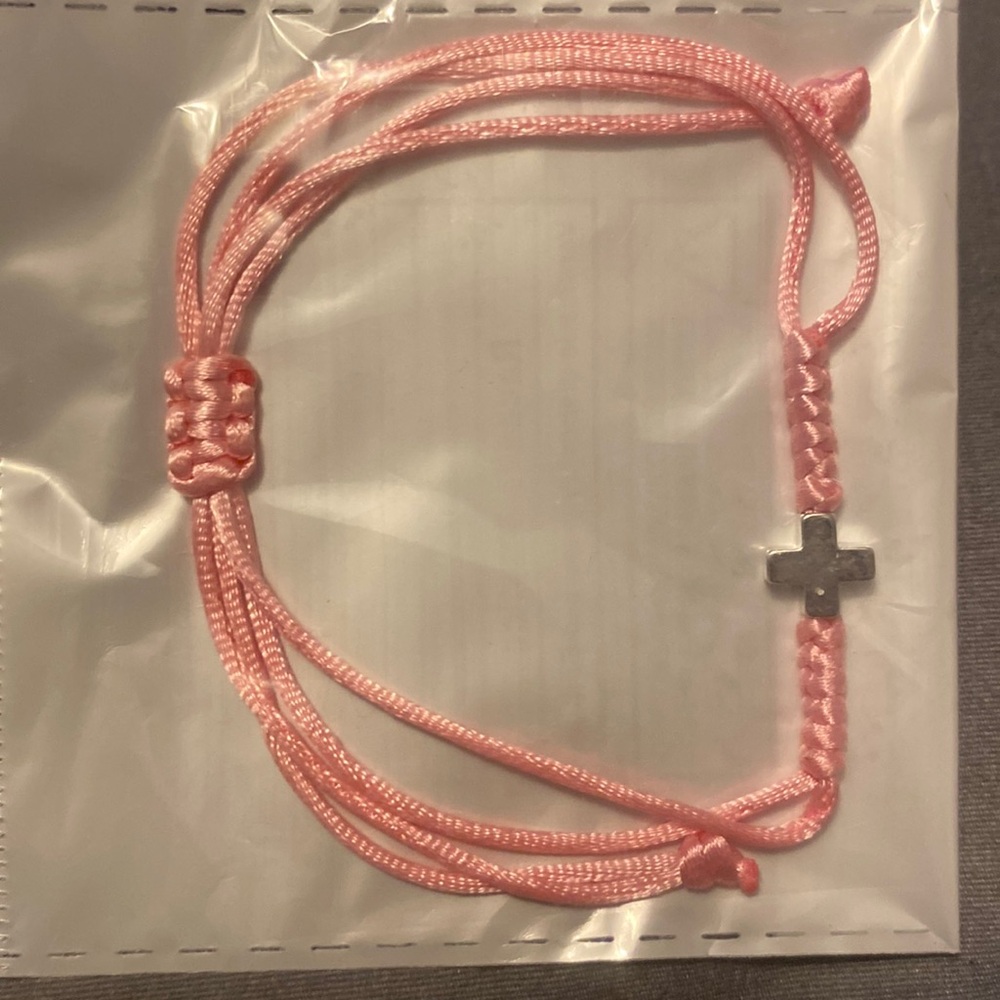 Count hand woven pink adjustable stainless steel cross bracelet